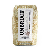 Gusto Crema blend cream colored bag with gold design