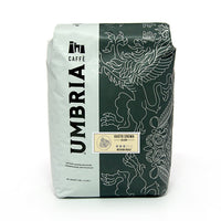 White and grey coffee bag with silver design, cream gusto cream blend medium roast label