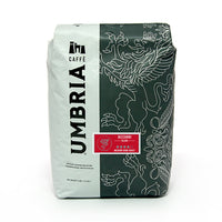a white and grey coffee bag with silver highlights and red bizzarri blend label