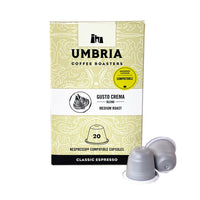 retail box of 20 gusto crema blend compostable nespresso compatible capsules with white capsules with white band in front