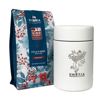 12oz bag of holiday blend bird friendly coffee and a white miir canister with engraved umbria logo
