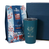 bird friendly holiday coffee bag with teal travel tumbler packaged in a gift box