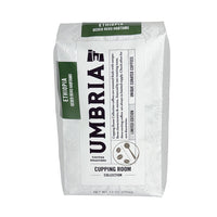 Umbria Ethiopia single origin coffee bag with green and black text on a white background. Light roast.