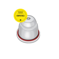 Compostable white capsule with red band image, and sticker overlay that reads compostable