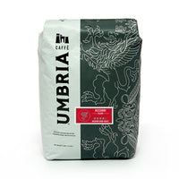 a white and grey coffee bag with silver highlights and red bizzarri blend label