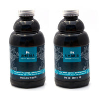 two bottles of coffee concentrate with blue and turquoise label