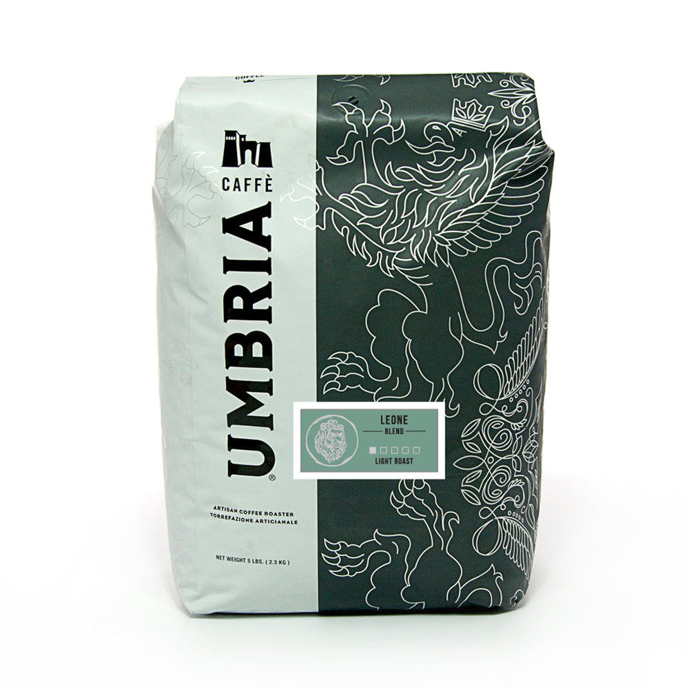 white and grey coffee bag with silver design and green leone blend light roast label