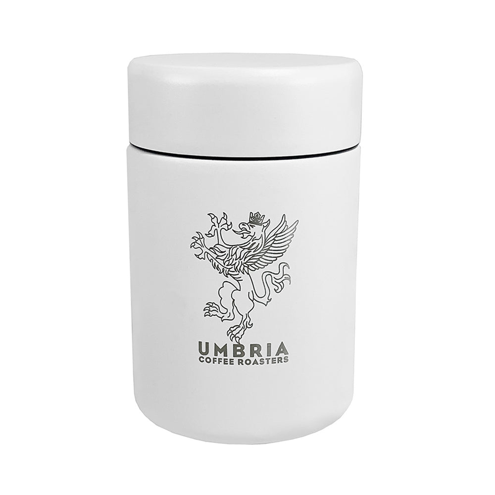 White coffee canister with laser engraved Umbria coffee roaster logo
