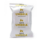 white pouch with yellow and black caffe umbria logo