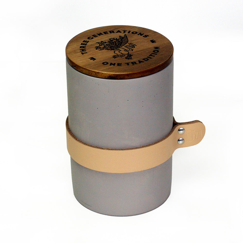 grey concrete canister with wood lid and leather tab